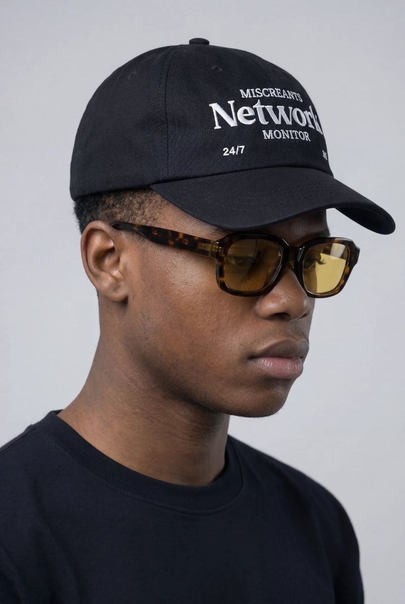 Model wearing the NetMon Hat - Black from Miscreants
