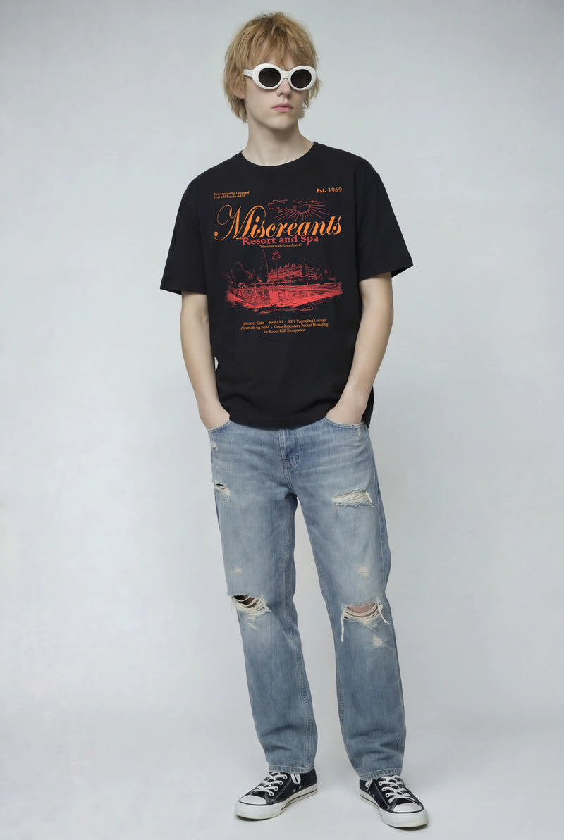 Model wearing the Resort & Spa T-Shirt from Miscreants