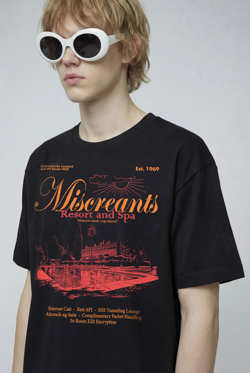 Model wearing the Resort & Spa T-Shirt from Miscreants