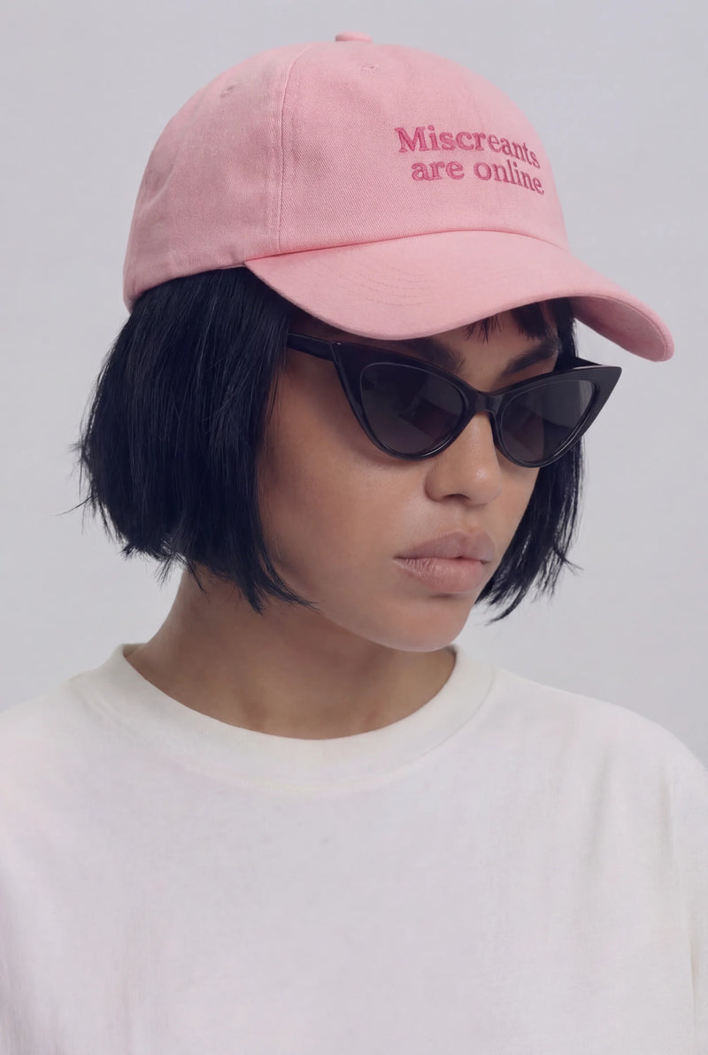 Online Hat - Pink embroidered cap from Miscreants — angled view